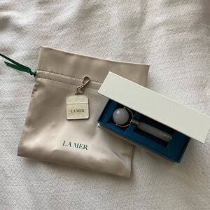 La Mer Face Roller, Drawstring Bag, and Bag Charm Bundle